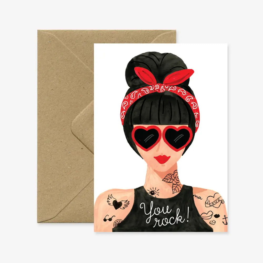 Illustration einer Frau mit hochgestecktem Haar und rotem Bandana, schwarzem Tanktop mit Schriftzug 'You rock!' und verschiedenen Tattoos auf Armen und Hals