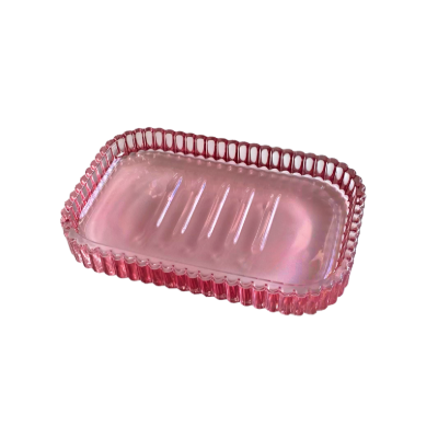 Rechteckige, durchsichtige Seifenschale mit geriffeltem Rand und Rillen in der Mitte.