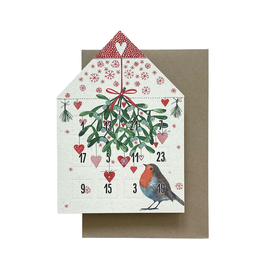 Papier-Teelichthaus als Adventskalender mit einem detailgetreuen Rotkehlchen und einem großen Mistelzweig mit roten Herz-Anhängern.