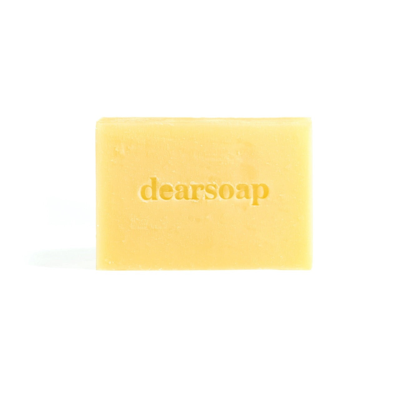 gelbes Seifenstück mit Aufschrift `dearsoap`