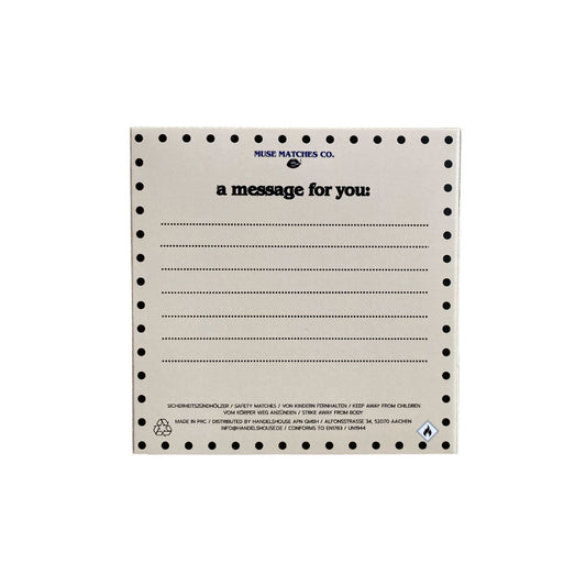 WeißeRücks eite der Eulen-Streichholzschachtel mit Linien für persönliche Texte und schwarzem "a message for you" Schriftzug.