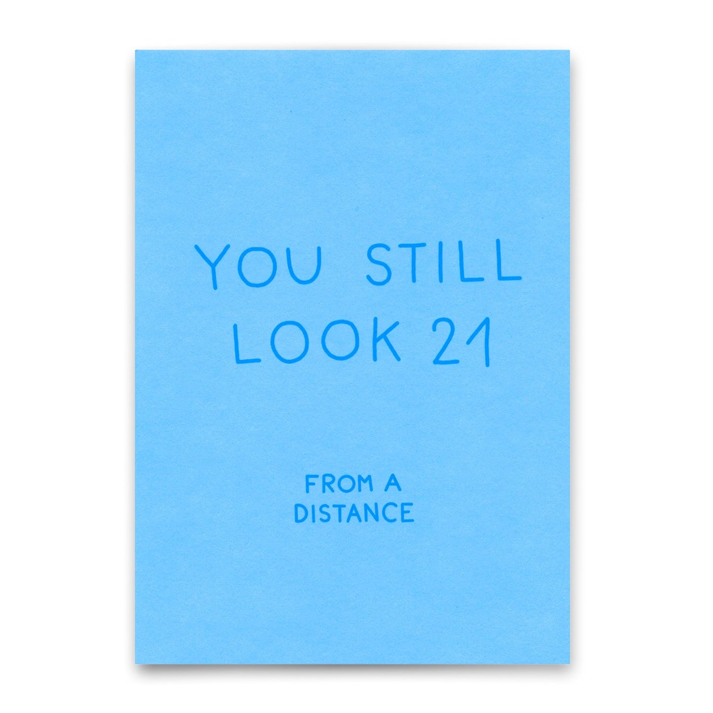 Karte mit dem Text 'You still look 21 from a distance' in blauer Schrift auf hellblauem Hintergrund