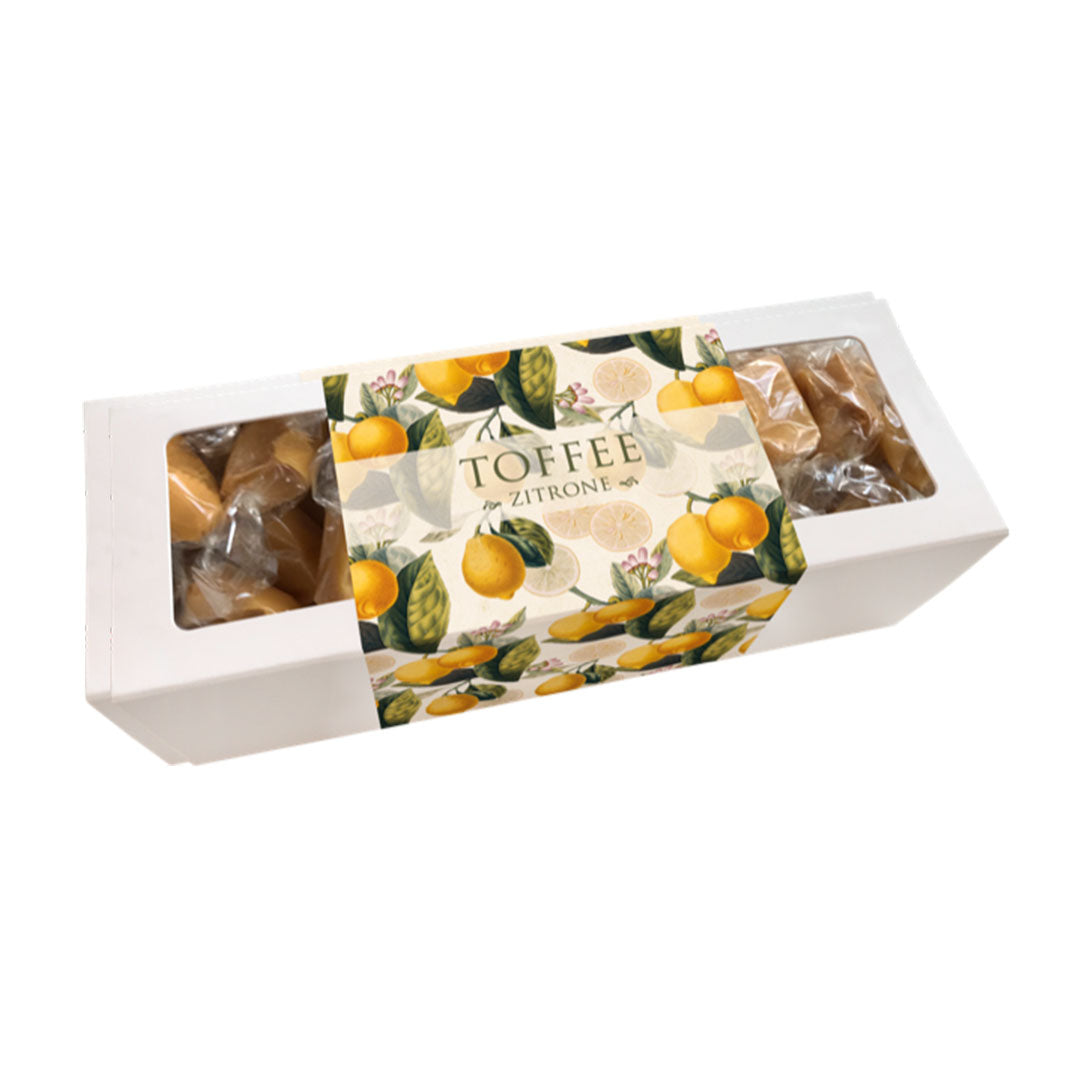 Sköna Ting Toffee Zitrone Verpackung mit botanischem Zitronen-Motiv