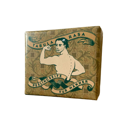 Handgemachte, quadratische Tabula Rasa Peelingseife Sandelholz von 1000&1 Seife in einer von Kat Menschik gestalteten Papierverpackung mit ausdrucksstarkem Motiv