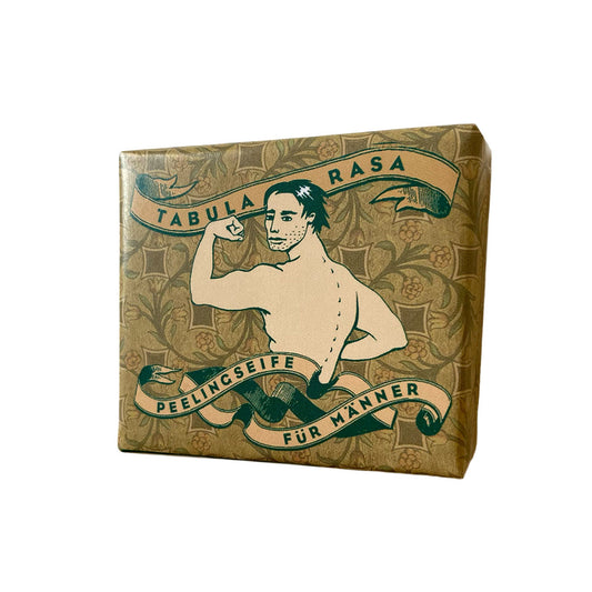 Handgemachte, quadratische Tabula Rasa Peelingseife Sandelholz von 1000&1 Seife in einer von Kat Menschik gestalteten Papierverpackung mit ausdrucksstarkem Motiv