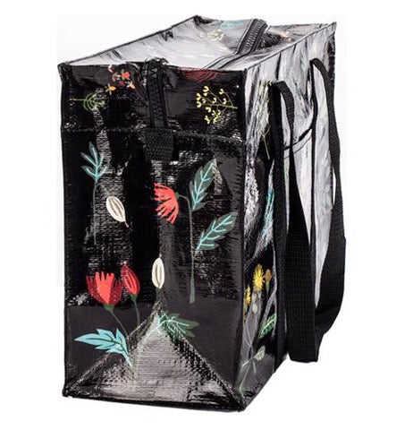 Schwarze Einkaufstasche mit bunten Blumenmotiven und schwarzen Tragegriffen, seitlich