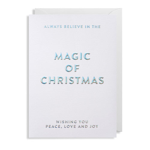 Weiße Weihnachtskarte mit hellblauem und grauem Text 'ALWAYS BELIEVE IN THE MAGIC OF CHRISTMAS' und 'WISHING YOU PEACE, LOVE AND JOY'.