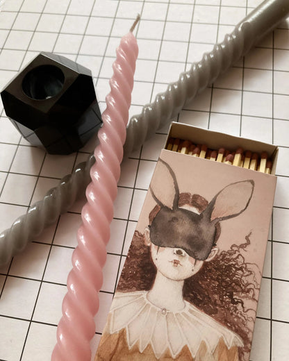 Streichhölzer mit Kerzen