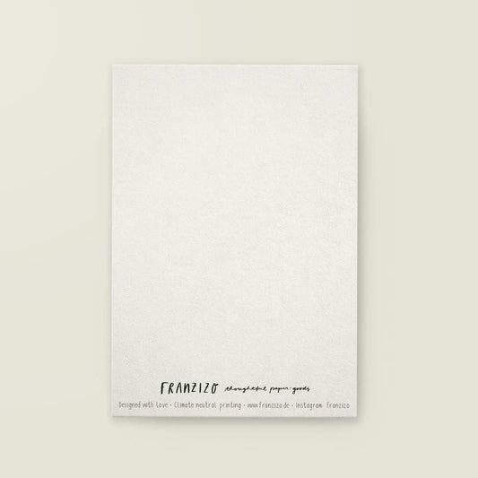 Rückseite der Postkarte weiß mit Aufschrift 'FRANZIZO thoughtful paper goods' und Hinweis auf klimaneutralen Druck