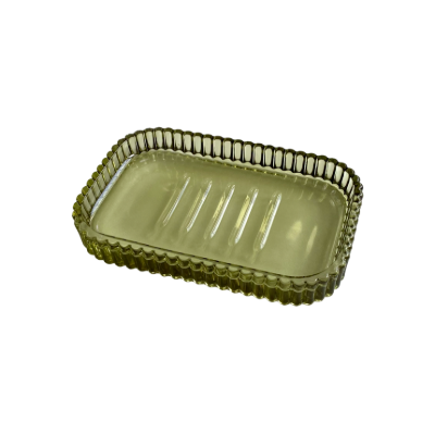 Rechteckige, durchsichtige Seifenschale mit geriffeltem Rand und Rillen in der Mitte.