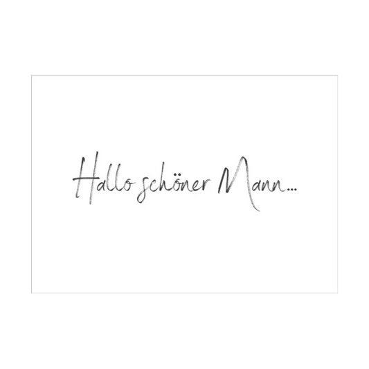 Dieses Bild zeigt eine minimalistische Postkarte mit weißem Hintergrund. Der schwarze Text in eleganter, fließender Schreibschrift lautet:
„Hallo schöner Mann…“