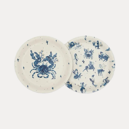 Zwei mit Sternzeichen illustrierte Untersetzer Krebs