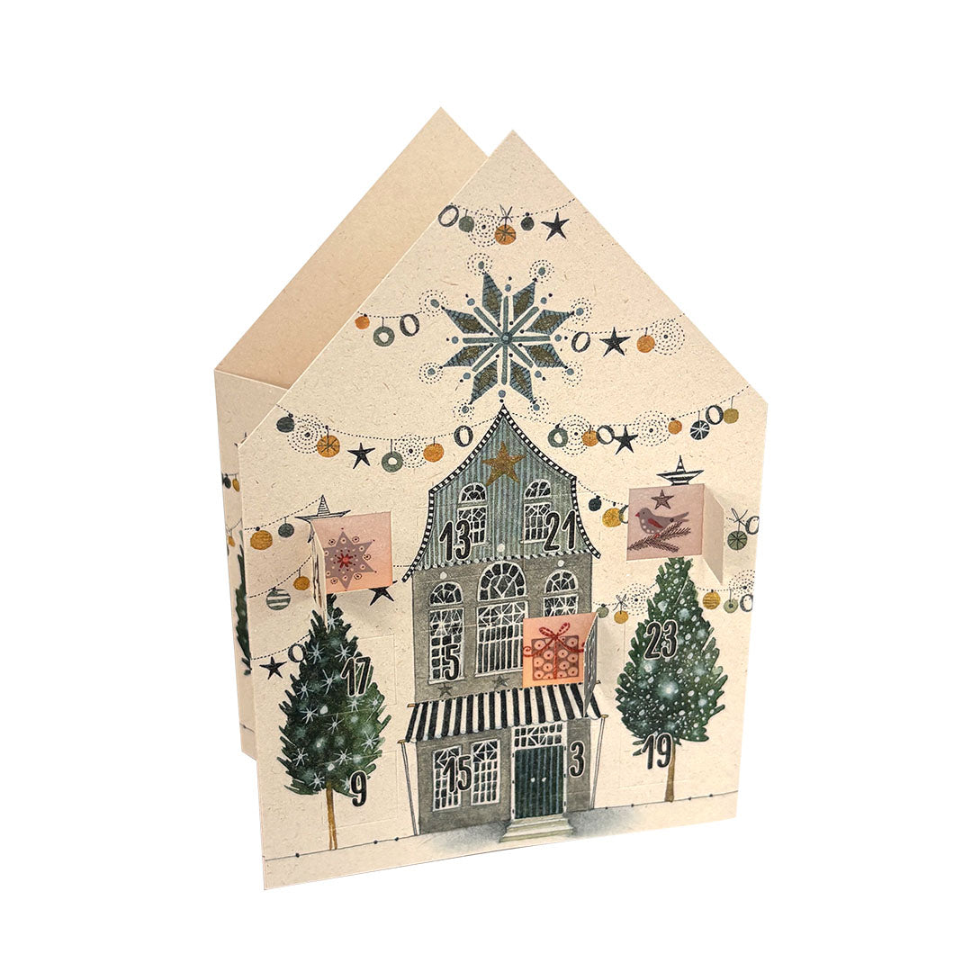 Edition Gollong leuchtendes Adventskalender-Haus mit der Illustration eines winterlichen Stadthauses im skandinavischen Stil und Sternengirlanden.