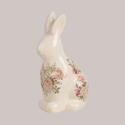 Dekorative Hasenfigur von Clayre & Eef in Cremeweiß, sitzend mit floralem Rosenmuster auf der Seite, glänzende Porzellan-Optik