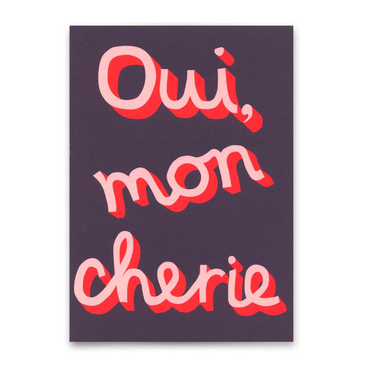 Dunkelviolette Karte mit dem verspielten, rosa-roten Schriftzug „Oui, mon cherie“ in 3D-Optik.