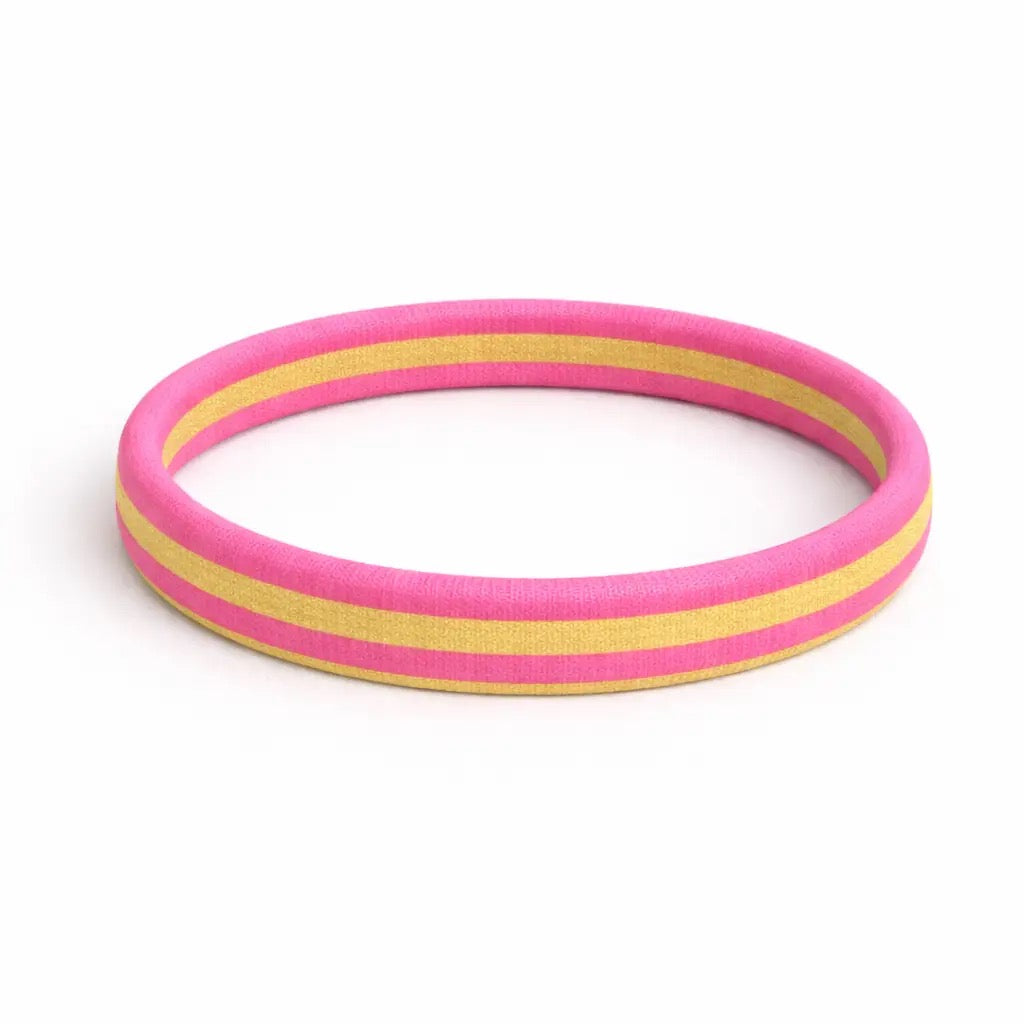 Farbenfrohes Haargummi ohne Metallummantelung in Pink und Gelb gestreift.