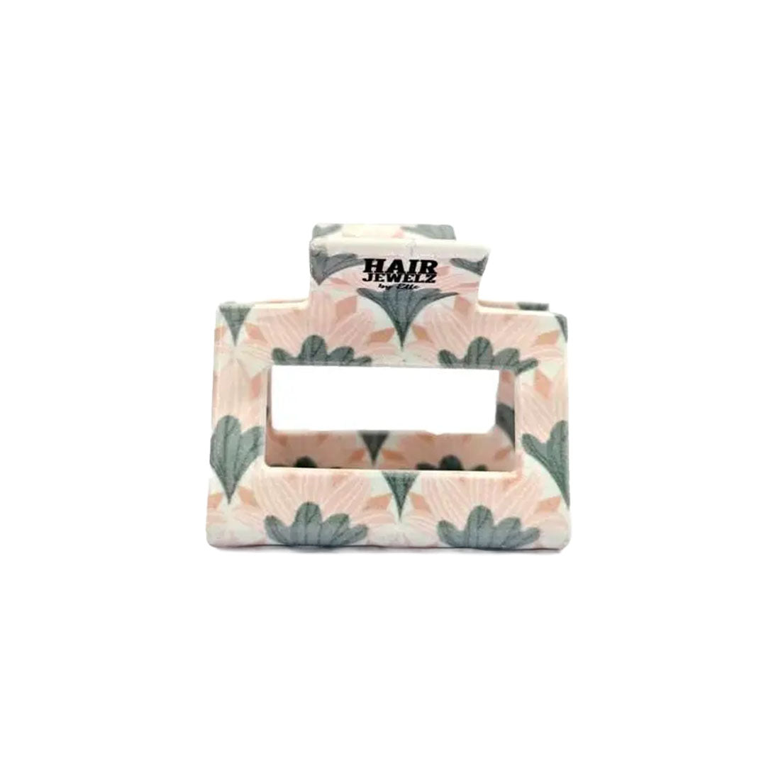 Rechteckige pastellfarbene Haarklammer von Hair Jewelz by Elle mit einem symmetrischen Blüten-Muster in zartem Rosa und Salbeigrün.
