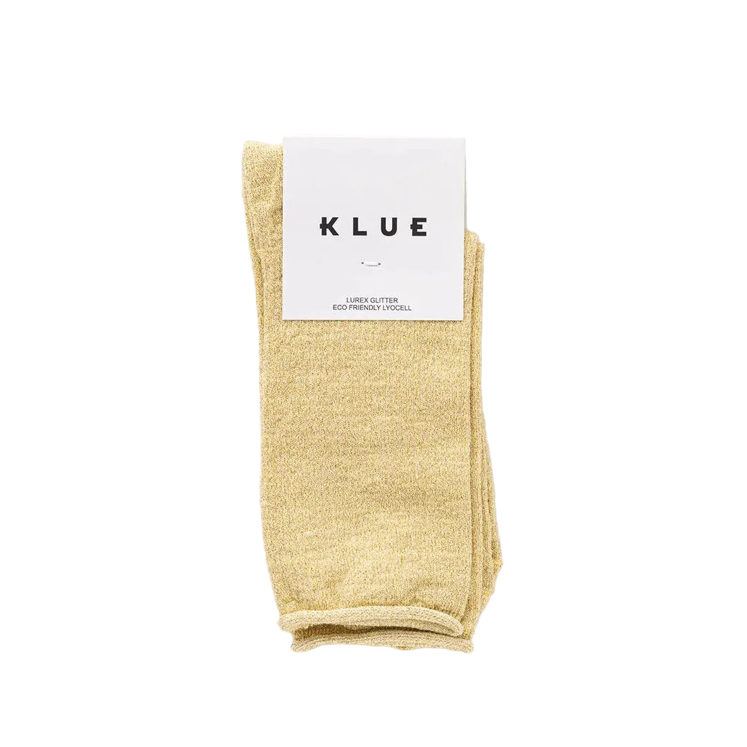 KLUE Lurex-Glitzersocken aus nachhaltigem Bamboo-Lyocell in Zitronengelb mit weißer Papier-Banderole auf weißem Hintergrund.