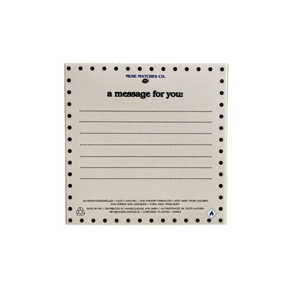 WeißeRücks eite der Eulen-Streichholzschachtel mit Linien für persönliche Texte und schwarzem "a message for you" Schriftzug.