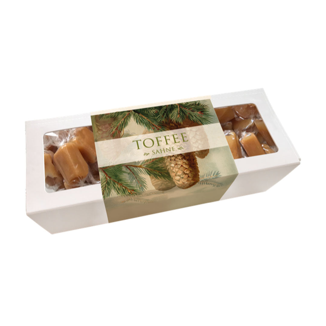 Sköna Ting Toffee Sahne in Geschenkbox mit botanischem Tannenzapfen-Motiv