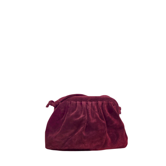 Elegante, weinrote Beuteltasche aus Samt-Wildleder mit geraffter Frontpartie und seitlichem Knoten-Detail.